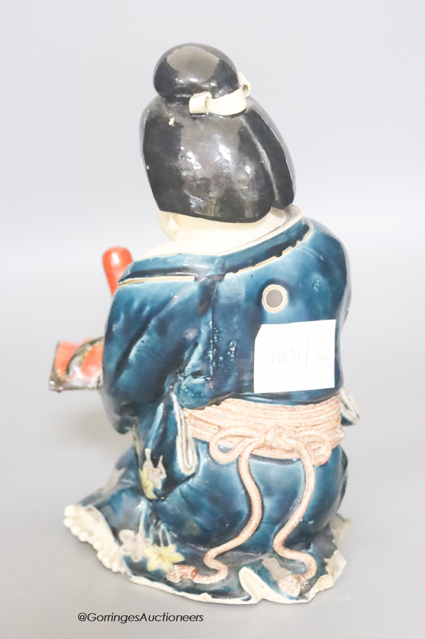 A 19th century Japanese Kutani pottery figure of an actress, height 25cm